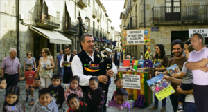 Gaiteros solidarios en España tocando música en la calle para recaudar material escolar para niños de Bolivia